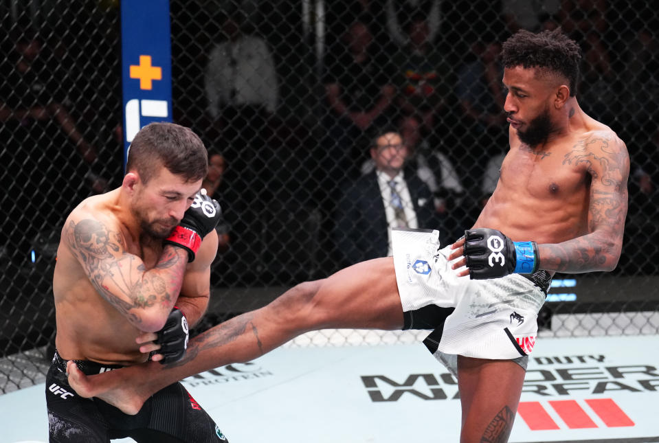 LAS VEGAS, NEVADA – NOVEMBER 18: (R-L) Jose Johnson kicks Chad Anheliger of Canada in a bantamweight fight during the UFC Fight Night event at UFC APEX on November 18, 2023 in Las Vegas, Nevada. (Photo by Chris Unger/Zuffa LLC via Getty Images)