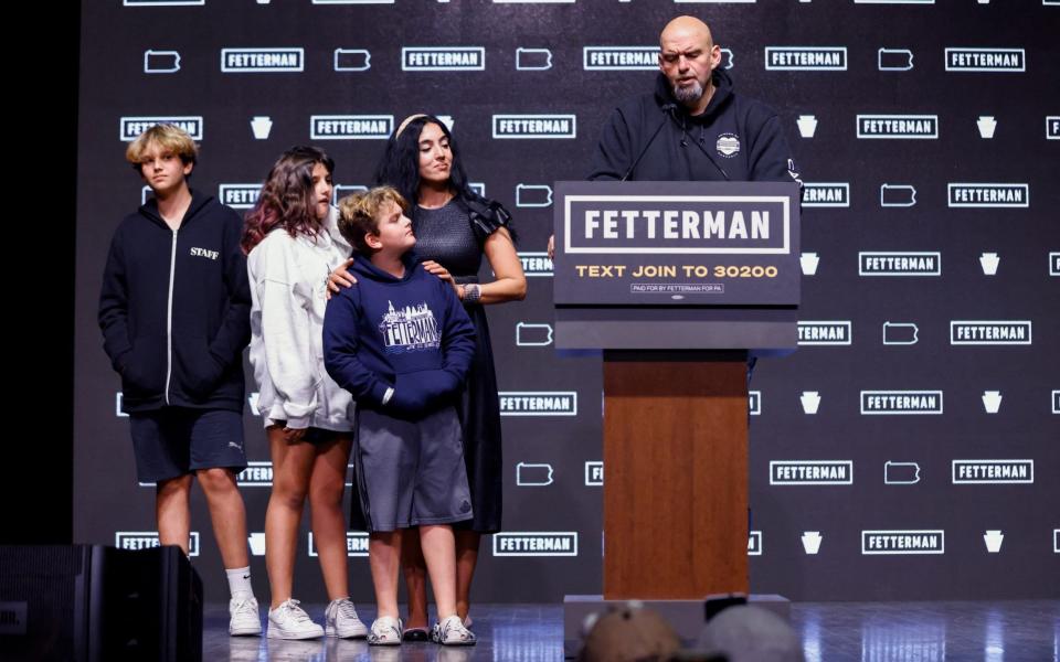 John Fetterman speaks alongside his wife Gisele Fetterman and children - REUTERS/Quinn Glabicki