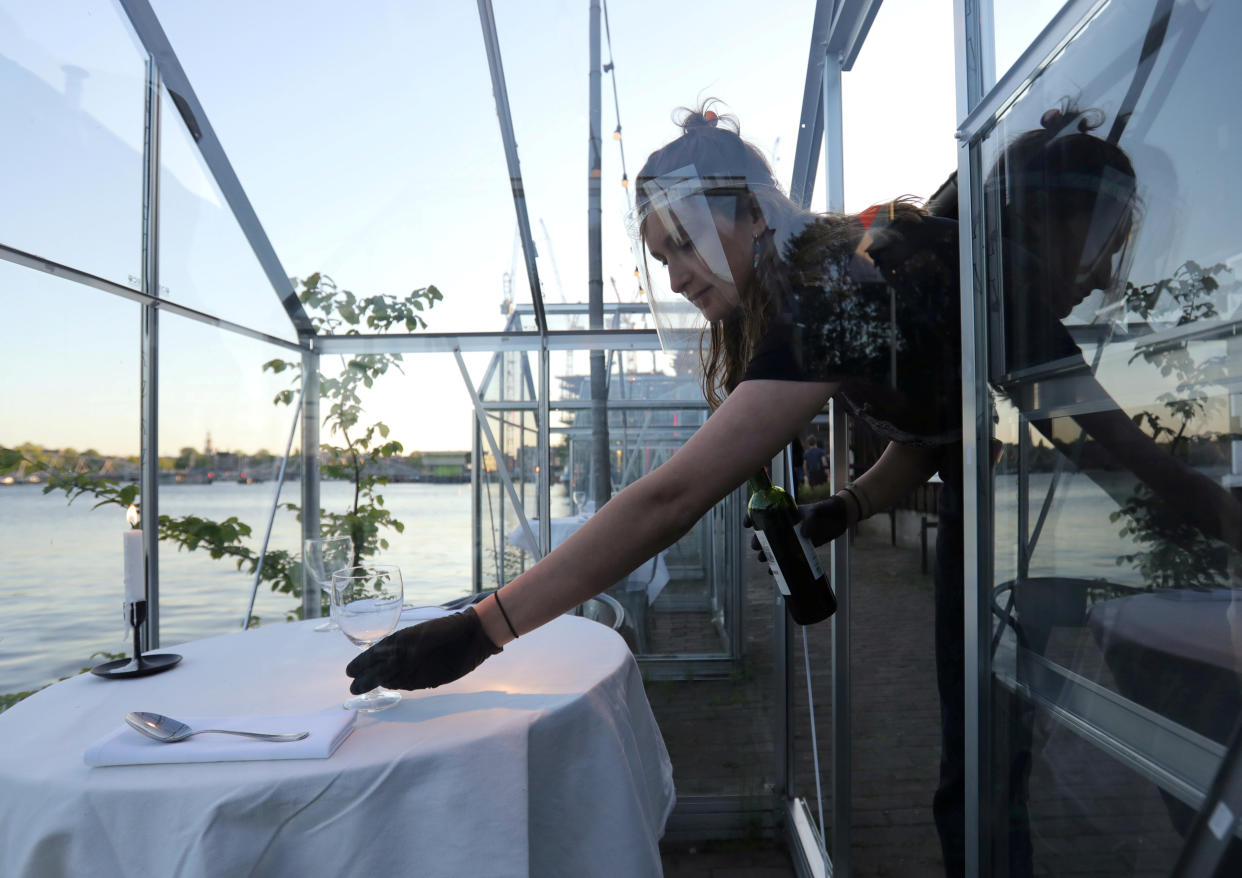 A server is seen with protective gear (Picture: Reuters)