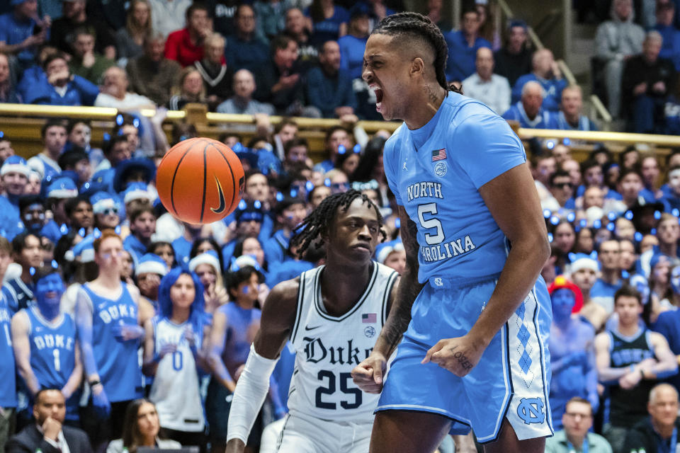 North Carolina forward Armando Bacot (5) reacts after a dunk against Duke in the first half of an NCAA college basketball game on Saturday, Feb. 4, 2023, in Durham, N.C. (AP Photo/Jacob Kupferman)