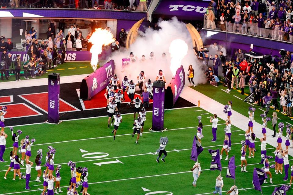 TCU runs onto the field ahead of their game against Georgia in the College Football Playoff National Championship on Monday, Jan. 9, 2023, in Inglewood, Calif.