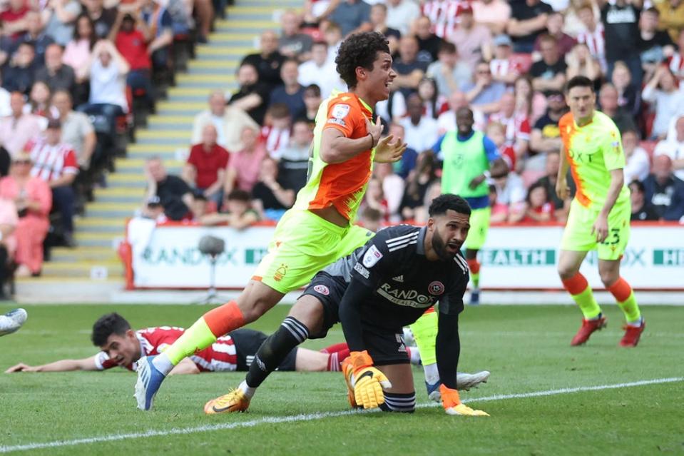 Brennan Johnson celebrates scoring Nottingham Forest’s second goal as Sheffield United goalkeeper Wes Foderingham looks dejected (Action Images/Reuters)