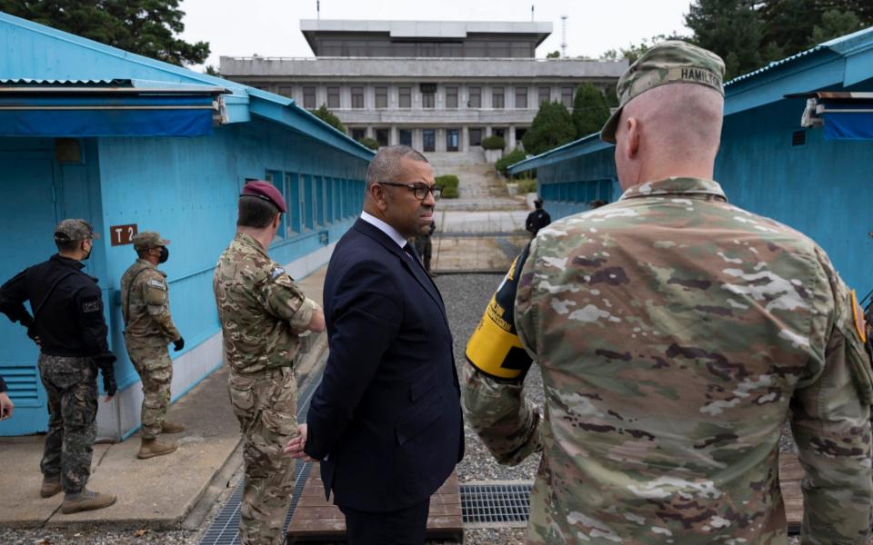 Foreign Secretary James Cleverly stands on border line separating the South and North of Korea during a visit to the Demilitarised Zone (DMZ) at Camp Bonifas in the Republic of Korea - Simon Dawson /No 10 Downing Street 