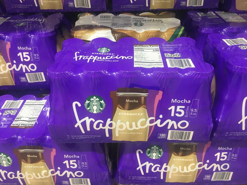 purple packs of starbuck frappuccinos stacked at costco