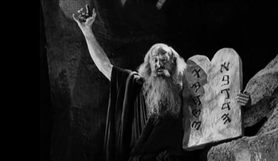 Theodore Roberts played Moses the Lawgiver in the 1923 black and white silent movie, The Ten Commandments by Cecil B. DeMille. Location scenes were filmed at the Guadalupe-Nipomo Dunes while others like this one were filmed on a studio backlot.