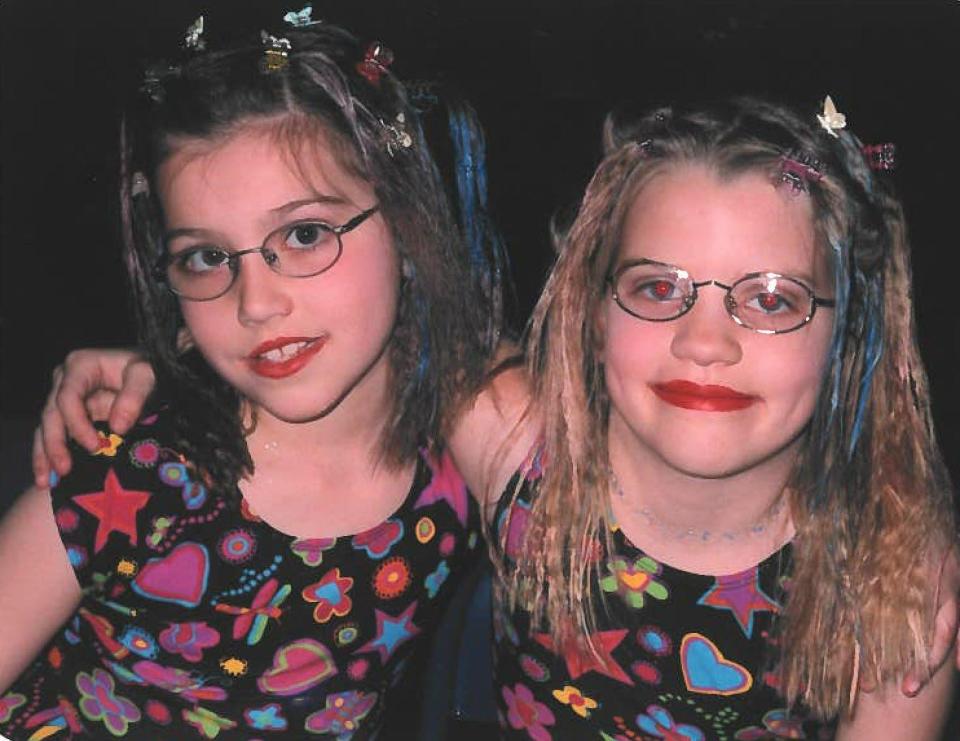 In 2001, Taylor Berken, left, and her friend Shayna Layoff, right, performed a choreographed dance to "(You Drive Me) Crazy" by Britney Spears at the Appleton Boys & Girls Club talent show. Berken is now the organization's director of behavioral support services.