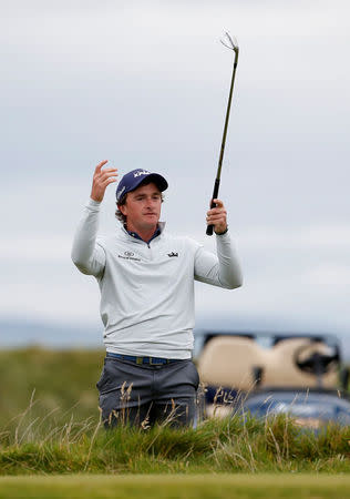 FILE PHOTO: Golf - European Tour - Alfred Dunhill Links Championship - St Andrews, Britain - October 8, 2017 Ireland's Paul Dunne reacts during the final round. Action Images via Reuters/Craig Brough