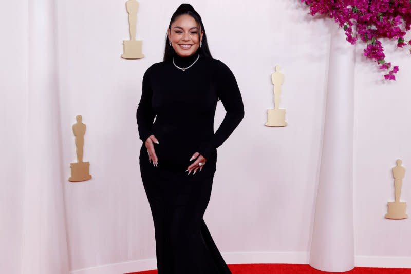 Vanessa Hudgens arrives on the red carpet at the 96th annual Academy Awards in Los Angeles on Sunday. Photo by John Angelillo/UPI
