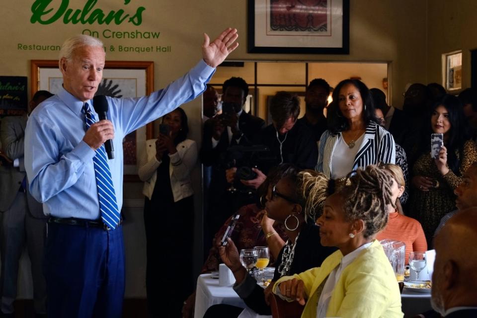 Democratic presidential candidate former Vice President Joe Biden speaks to community faith leaders after serving up breakfast during a visit to Dulan's soul food on Crenshaw, Thursday, July 18,2019 in Los Angeles. Biden spoke to black pastors and community leaders at Dulan's on Crenshaw sole food restaurant during a campaign tip to Los Angeles. He said Trump is ripping apart the country's social fabric and that Democrats must defeat him, regardless of whether Biden is the party's nominee or not. (AP Photo/Richard Vogel) thegrio.com