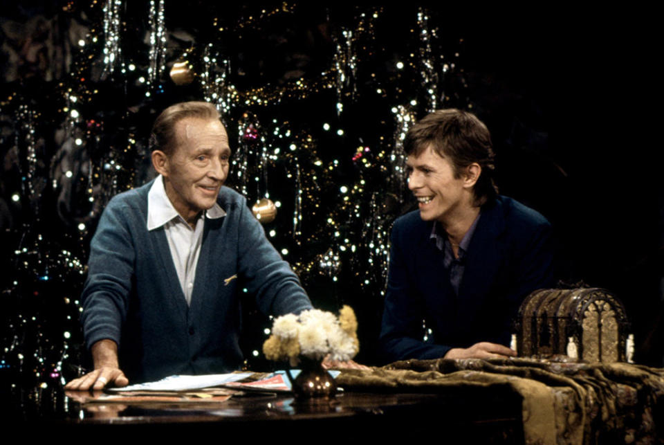 <p>Just a month before he died in 1977, legendary singer <a rel="nofollow noopener" href="https://www.youtube.com/watch?v=ADbJLo4x-tk" target="_blank" data-ylk="slk:Bing Crosby hosted Bowie on a Christmas special;elm:context_link;itc:0;sec:content-canvas" class="link ">Bing Crosby hosted Bowie on a Christmas special</a>. Bowie wasn’t much of a fan of the old classic “Little Drummer Bowie,” so he sang a new song, “Peace on Earth,” while Crosby crooned the older tune. (Photo: Everett)</p>