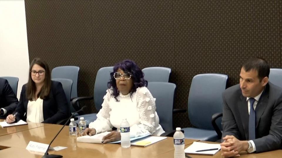 Freeman sits at a desk in prerecorded testimony shown during the hearing.