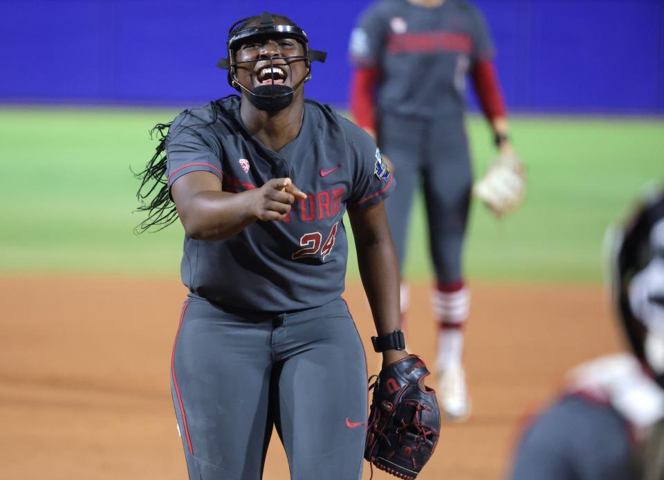 Stanford's NiJaree Canady (24) celebrates during a Women's College World Series softball game between the Stanford Cardinal and the UCLA Bruins at Devon Park in Oklahoma City, Sunday, June 2, 2024. Stanford won 3-1.