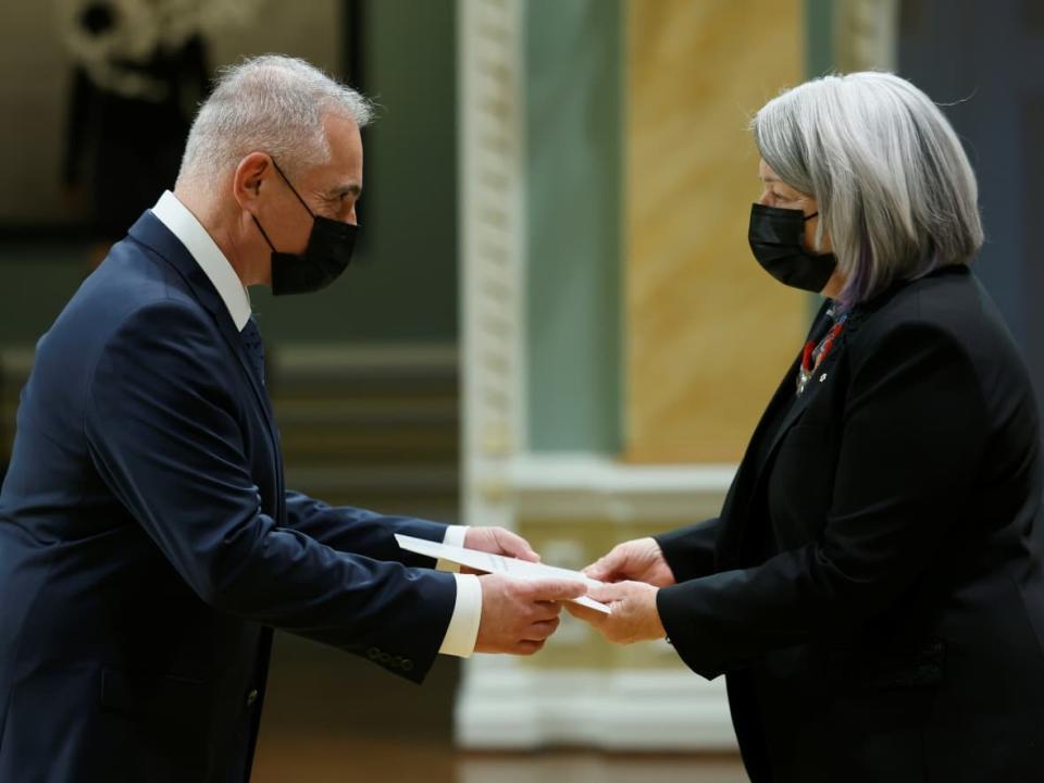 Israel’s ambassador to Canada, Ronen Hoffman, presents his credentials to Canada's Governor General Mary Simon during a ceremony at Rideau Hall in Ottawa on Dec. 7, 2021. Hoffman announced Saturday he intends to quit his post early. (Blair Gable/Reuters - image credit)