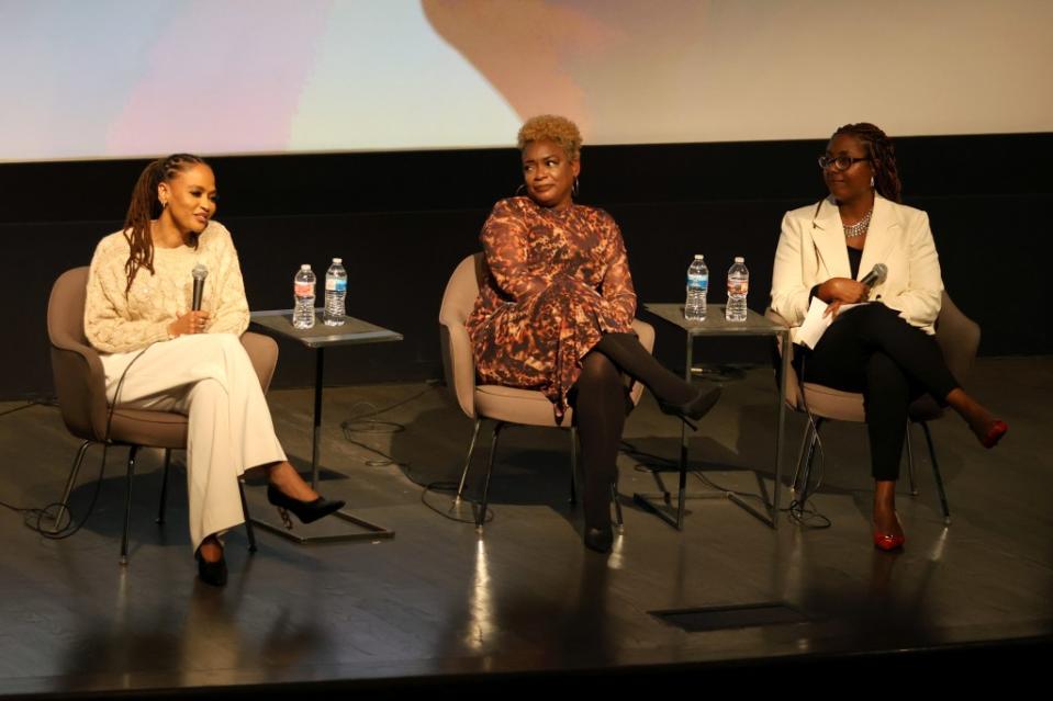 During a Q&A session Saturday, “Origin,” director Ava DuVernay (left) shares a stage with actress, Aunjanue Ellis-Taylor (center), and Dr. Kenya Davis at the Museum of Tolerance in Los Angeles. (Photo by Steven Simione/Getty Images)