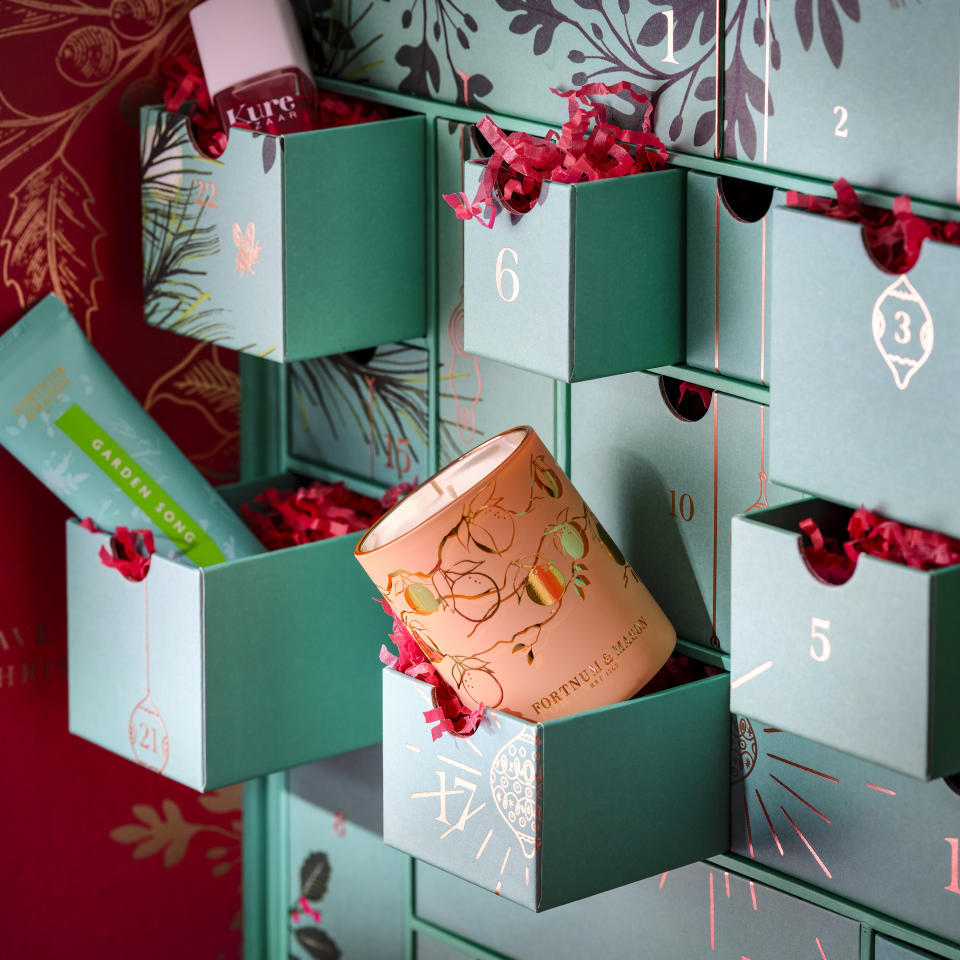 Inside are 30 products in totals, wrapped in tissue behind 25 doors. (Fortnum & Mason)