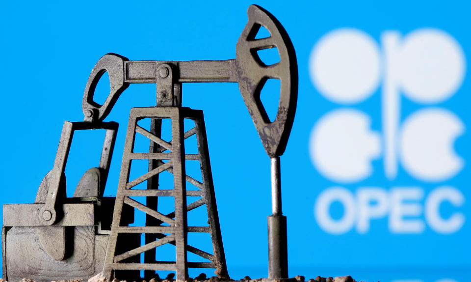 A 3D printed oil pump jack is seen in front of displayed Opec logo in this illustration picture, April 14, 2020. REUTERS/Dado Ruvic/Illustration