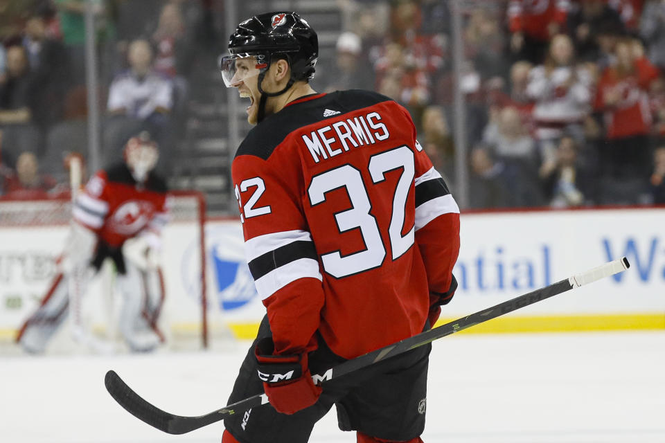 New Jersey Devils defenseman Dakota Mermis celebrates his goal during the second period of an NHL hockey game against the St. Louis Blues, Friday, March 6, 2020, in Newark. (AP Photo/John Minchillo)