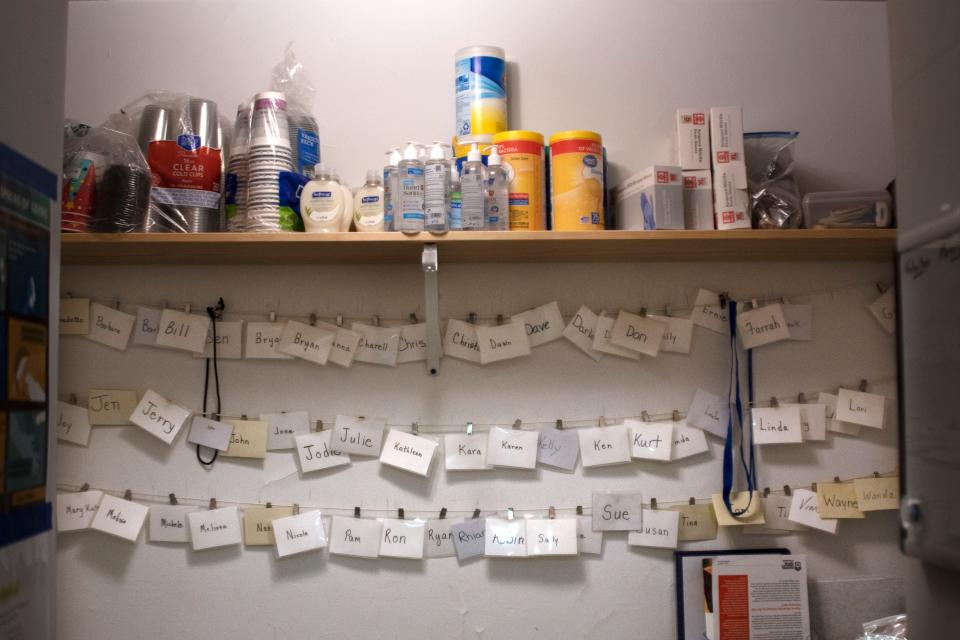 Volunteer nametags hang on the wall in the break room at the Code Blue Shelter located in Quakertown Masonic Lodge in Quakertown on Monday, Nov. 22. 