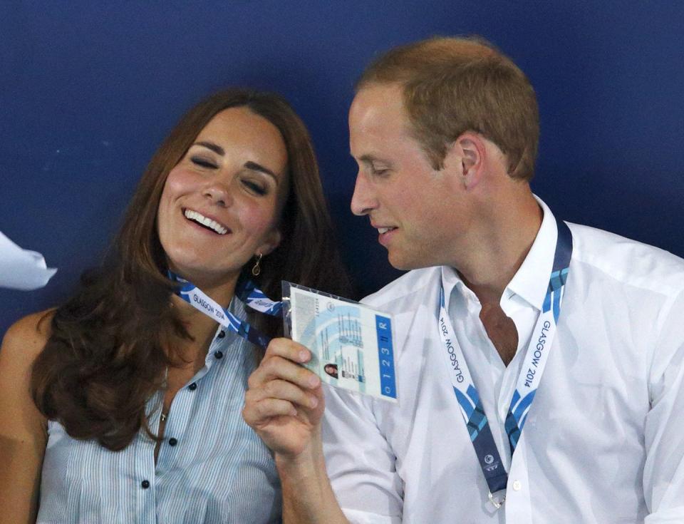 Kate Middleton gets the royal fanning treatment.