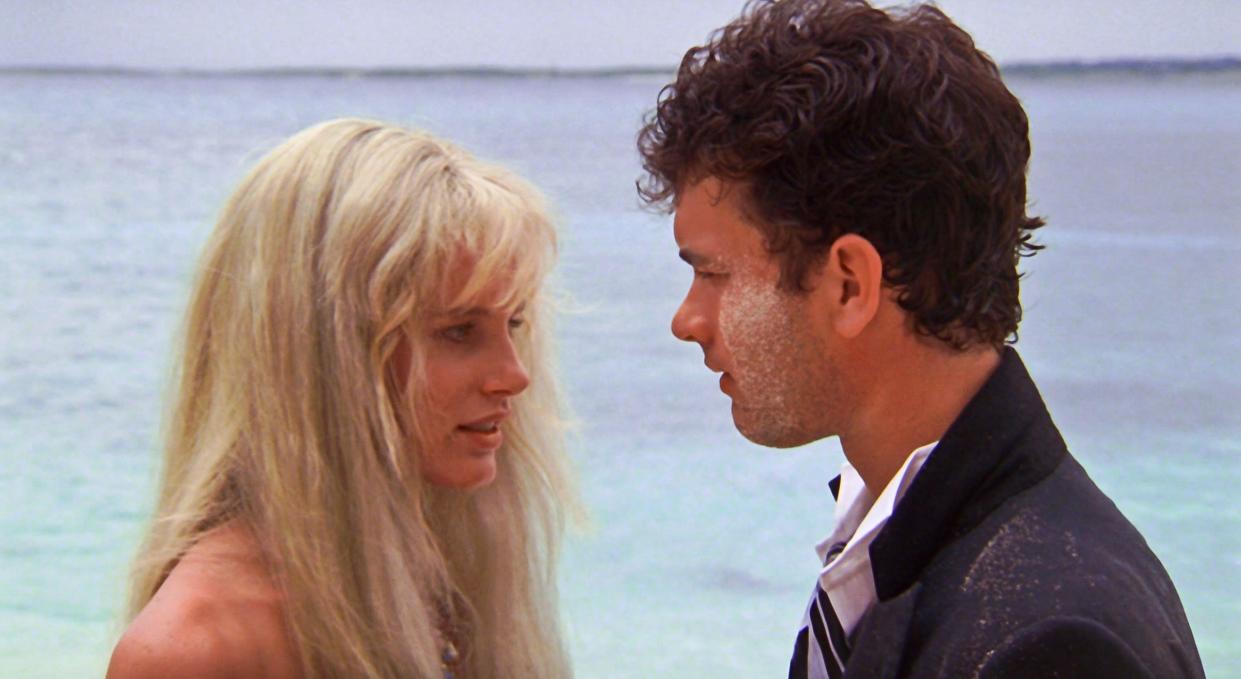 USA. Tom Hanks and Daryl Hannah  in a scene from ©Buena Vista Pictures film: Splash (1984). Plot: A young man is reunited with a mermaid who saved him from drowning as a boy. He falls in love with her, not knowing who or what she is.  Ref: LMK110-J6577-110620 Supplied by LMKMEDIA. Editorial Only. Landmark Media is not the copyright owner of these Film or TV stills but provides a service only for recognised Media outlets. pictures@lmkmedia.com