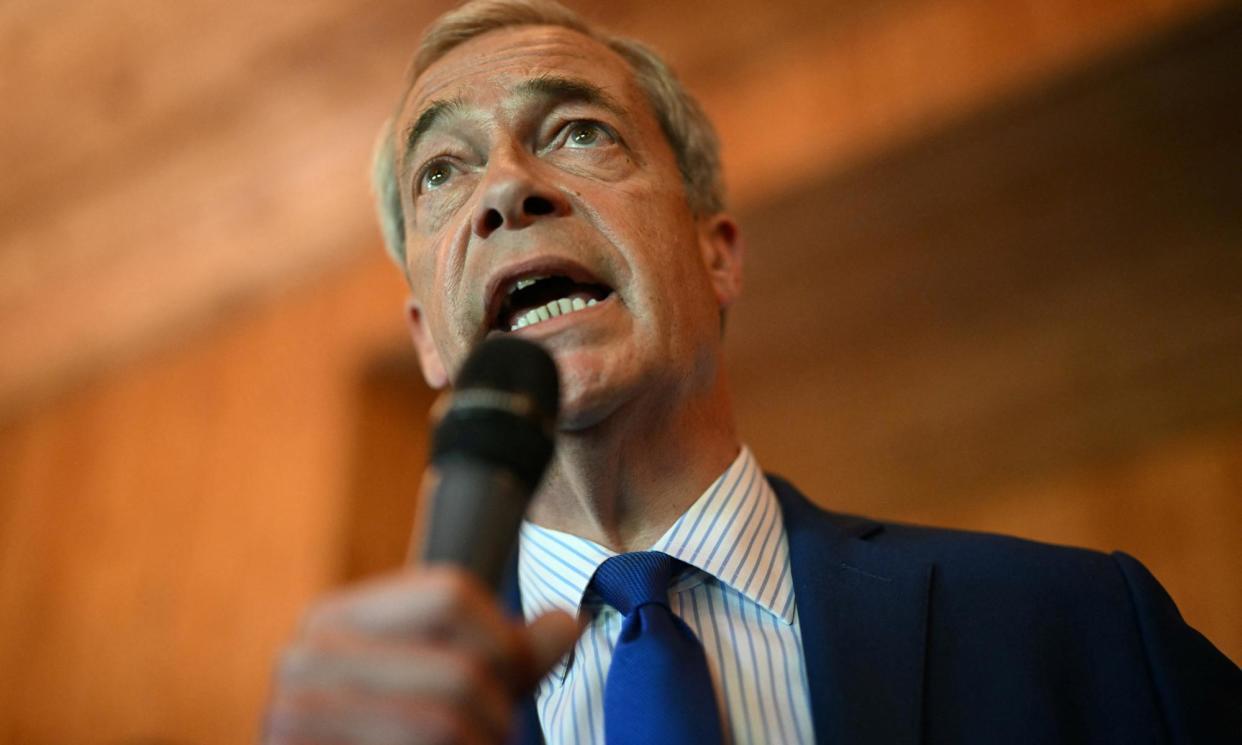 <span>Farage praised Tate for defending ‘male culture’ in a podcast episode that aired in February.</span><span>Photograph: Oli Scarff/AFP/Getty Images</span>