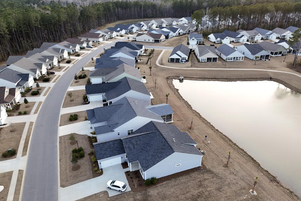 FILE - Aerial photo showing new housing development in Okatie, South Carolina, Feb. 1, 2024. Rhode Island House Speaker Joseph Shekarshi is pushing a dozen bills aimed at addressing the state's ongoing housing crisis. Shekarshi said he wants Rhode Island to be a state where families can raise their children, young people can live close to their parents and hometowns, and seniors can age with dignity.  (AP Photo/Jean J. Pasker, File)