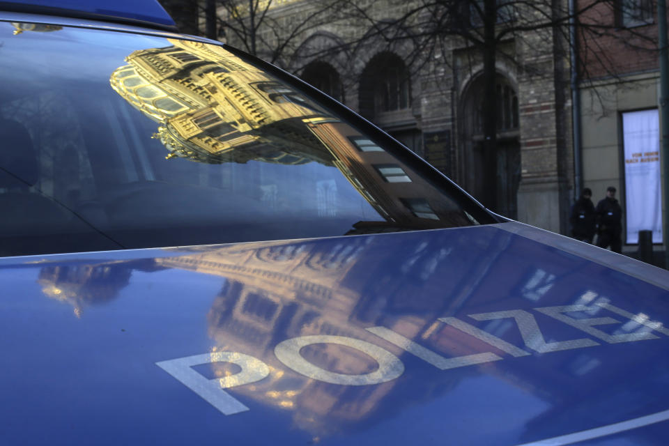 In this Jan. 7, 2014 photo, the Neue Synagoge (New Synagogue) is reflected in the windshield of a police vehicle in Berlin. The 10,000-member Jewish Community of Berlin, which experienced a stirring post-Holocaust rebirth, is in danger of falling apart - riven by cultural rivalries, its finances under official scrutiny. At the center of the storm is Gideon Joffe, who was elected nearly two years ago as community president. (AP Photo/Markus Schreiber)