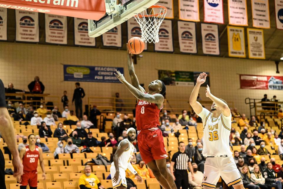 Bradley guard Terry Roberts slashes to the rim for a layup during BU's 71-56 victory in an MVC game at Athletics Recreation Center in Valparaiso, Ind., on Jan. 26, 2022.