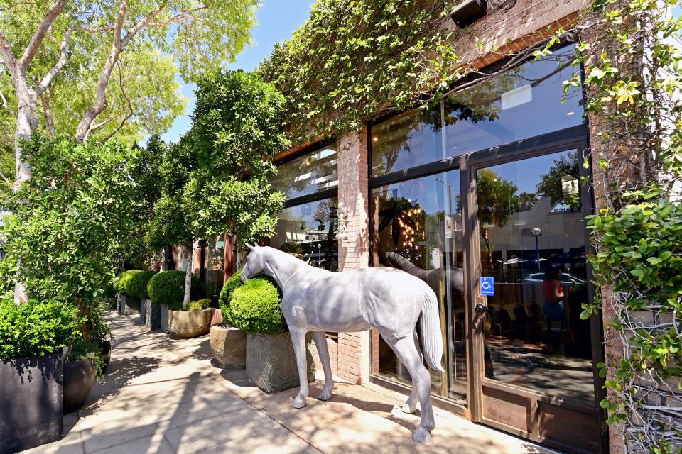 Exterior of Woody Harrelson’s The Woods cannabis dispensary in West Hollywood. - Credit: Stefanie Keenan/Getty Images for The Woods