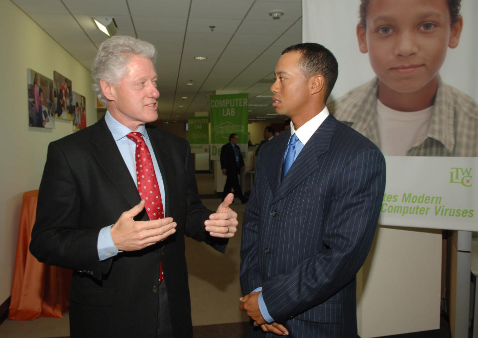 President Clinton and Tiger Woods. (Getty)
