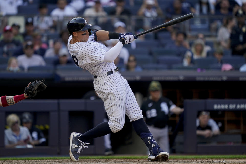 New York Yankees' Aaron Judge hits a game-tying home run off Chicago White Sox relief pitcher Kendall Graveman in the eighth inning of a baseball game, Sunday, May 22, 2022, in New York. (AP Photo/John Minchillo)
