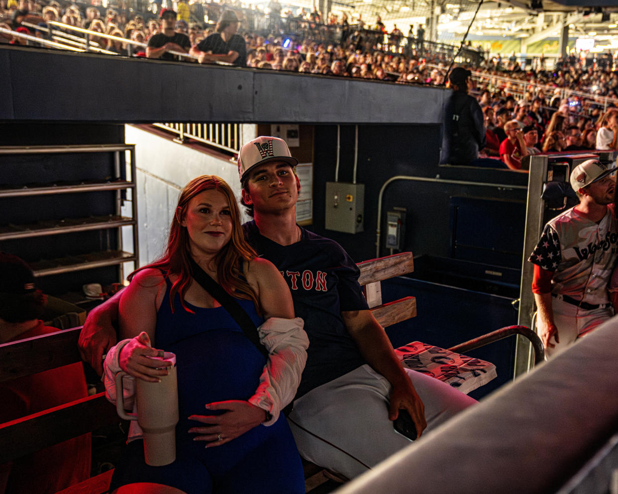 Zach Penrod and his wife, Kyla, watch the Fourth of July fireworks at Polar Park.