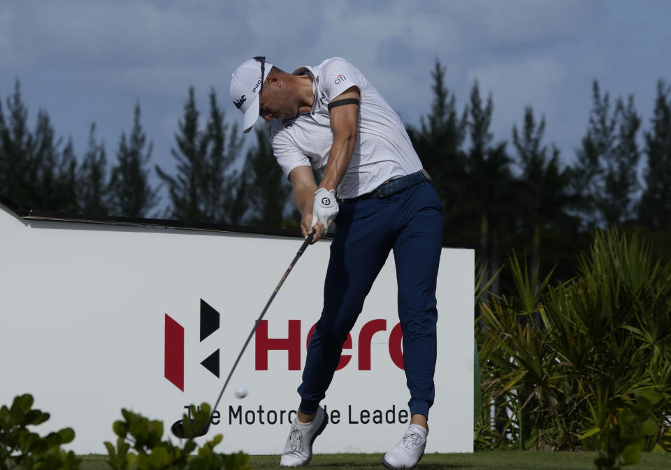 Justin Thomas, of the United States, tees off on the fourth tee during the final round of the Hero World Challenge PGA Tour at the Albany Golf Club, in New Providence, Bahamas, Sunday, Dec. 4, 2022. (AP Photo/Fernando Llano)
