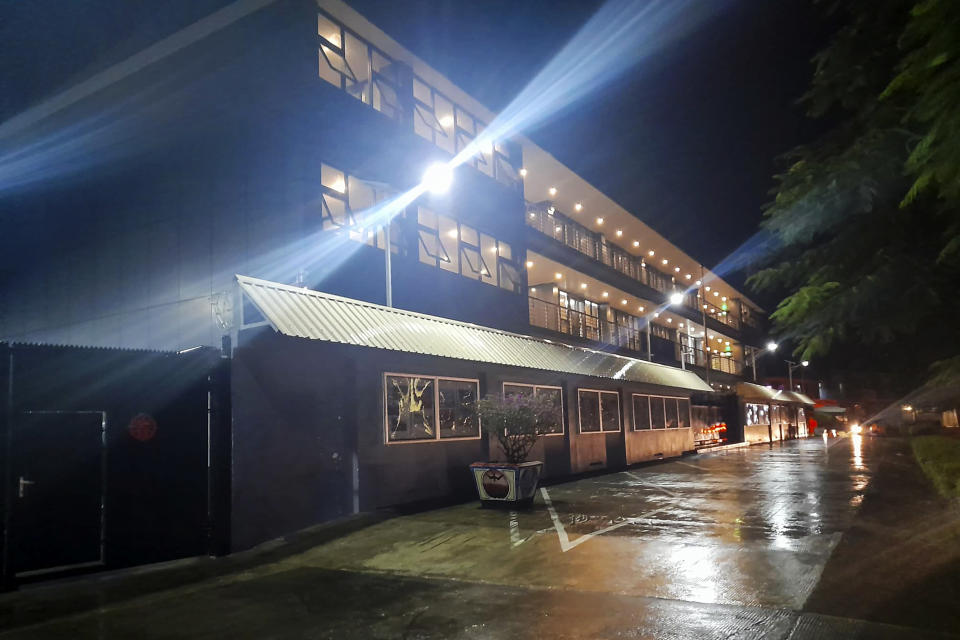 FILE - Floodlights illuminate the Chinese Embassy after a rain in Honiara, Solomon Islands, April 1, 2022. A security alliance between China and the Solomon Islands has sent shudders throughout the South Pacific, with many worried it could set off a large-scale military buildup or that Western animosity to the deal could play into China’s hands. (AP Photo/Charley Piringi, File)