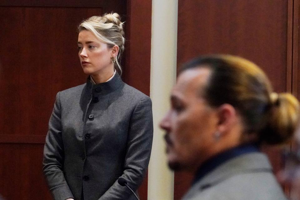 Actor Johnny Depp walks into the courtroom after a break at the Fairfax County Circuit Courthouse in Fairfax, Virginia, on May 16, 2022. - Actor Johnny Depp sued his ex-wife Amber Heard for libel in Fairfax County Circuit Court after she wrote an op-ed piece in The Washington Post in 2018 referring to herself as a 