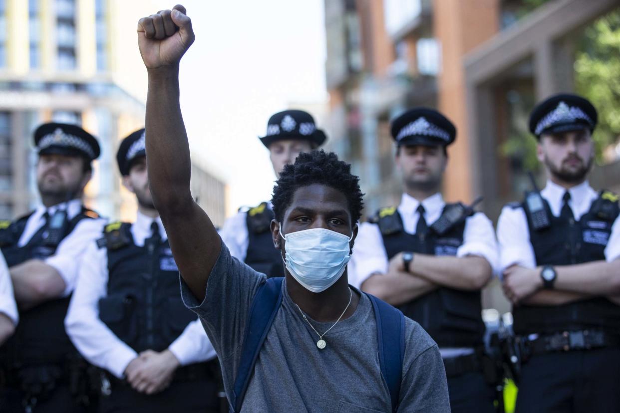 Police were out in force as protesters marched through the city: Getty Images