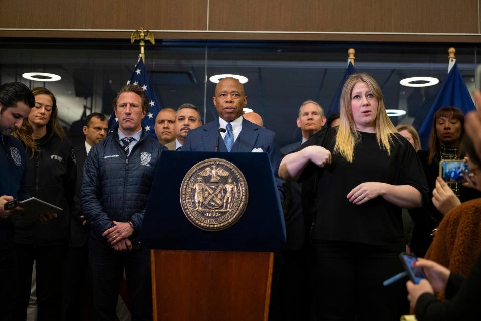 New York City Mayor Eric Adams speaks alongside commissioner Zachary Isco during a news conference about Friday’s  earthquake (AP)