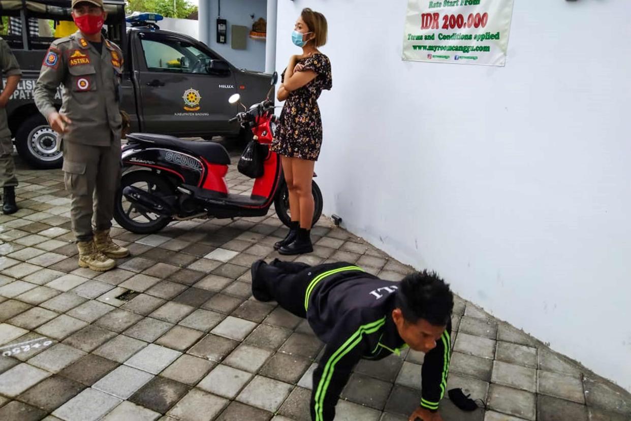 <p>In September, Bali started fining residents caught without a face mask 100,000 rupiah (£5.20).</p> (SATPOL PP/AFP via Getty Images)