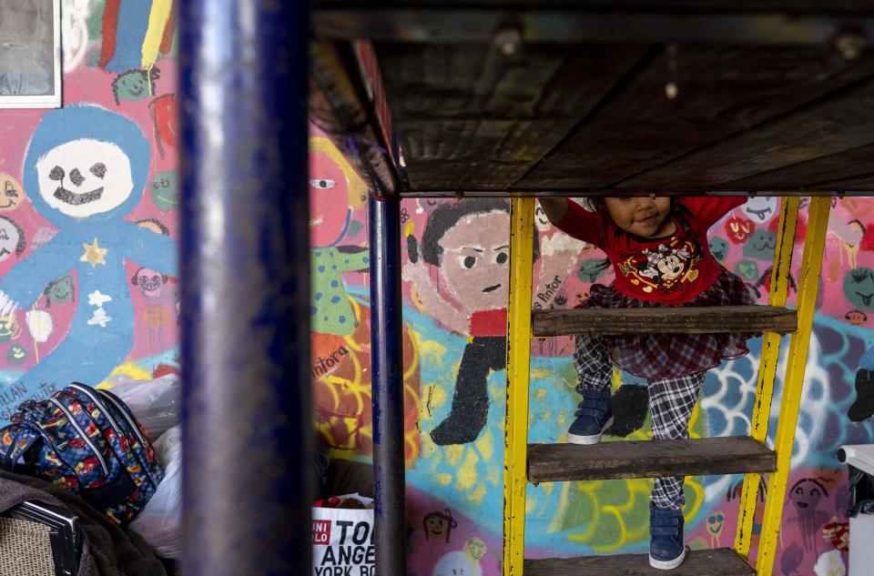 A child plays at one of the shelters in Tijuana, Mexico, February 2019, where migrants wait to meet with U.S. immigration officials and claim asylum in the United States.