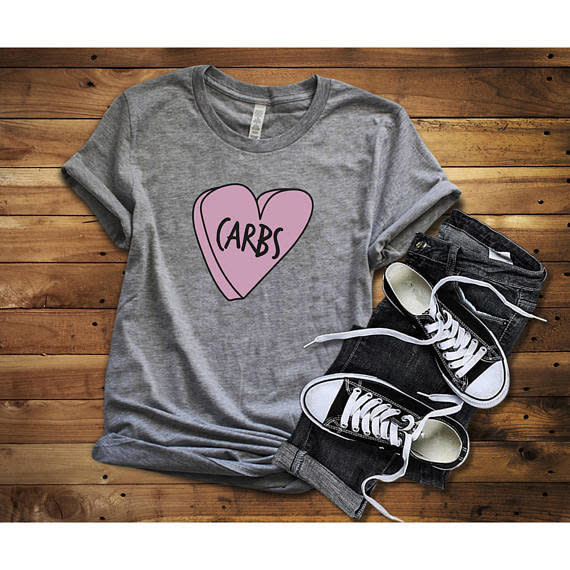 Get it <a href="https://www.etsy.com/listing/569755590/carbs-funny-shirt-valentines-day-shirt?ga_order=most_relevant&amp;ga_search_type=all&amp;ga_view_type=gallery&amp;ga_search_query=anti%20valentines%20day&amp;ref=sr_gallery-1-18" target="_blank">here</a>.&nbsp;