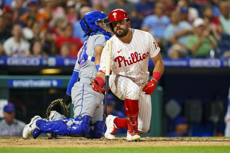 Philadelphia Phillies' Kyle Schwarber reacts to striking out during the third inning of a baseball game against the New York Mets, Friday, Aug. 19, 2022, in Philadelphia. (AP Photo/Chris Szagola)