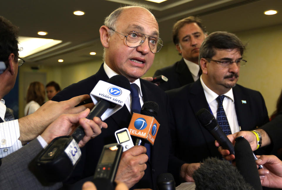 Argentina's Foreign Minister Hector Timerman speaks with reporters at the G-20 summit in Los Cabos, Mexico, Tuesday, June 19, 2012. Timerman described an exchange between Argentina's President Cristina Fernandez and British Prime Minister David Cameron during the plenary session of the G-20 regarding the Falklands Islands. Argentina claims the Falkland Islands, called "Las Malvinas" by Argentina, belong to Argentina, and claims Britain has illegally occupied the islands since 1833. (AP Photo/Andres Leighton)