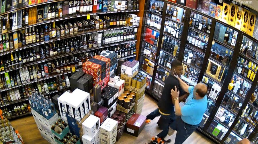 Security video captured a thief escaping with a $1,000 bottle of liquor during a violent confrontation at a liquor store in Calabasas on Aug. 31, 2023. (Malibu Liquor and Wine)