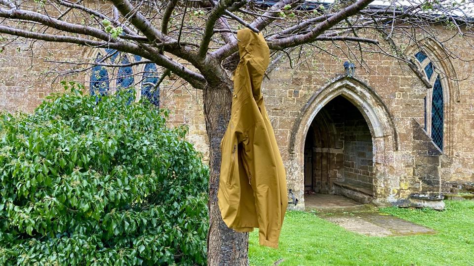 Rab Namche Gore-Tex Jacket hanging on a tree