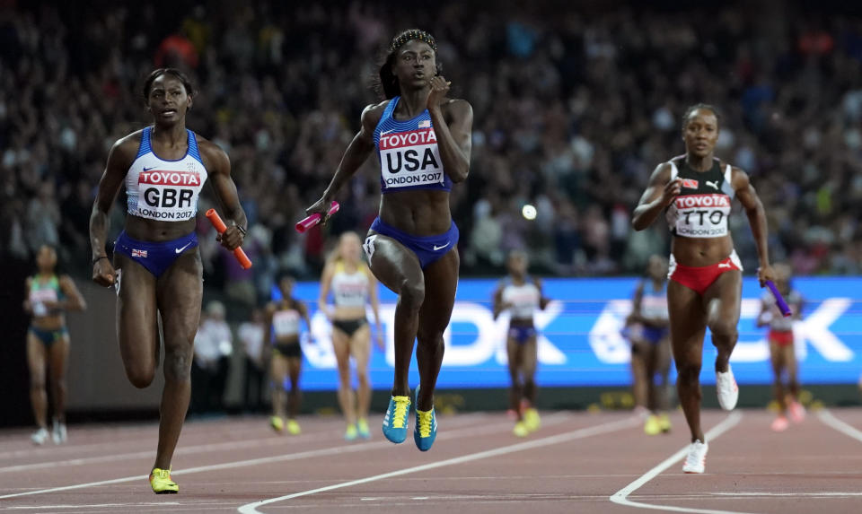 FILE - United States' Tori Bowie, center, anchors the U.S. team to gold in the women's 4x100m relay final during the World Athletics Championships in London Saturday, Aug. 12, 2017. At left is Britain's Daryll Neita, who took the silver. Tori Bowie, the sprinter who won three Olympic medals at the 2016 Rio de Janeiro Games, has died, her management company and USA Track and Field said Wednesday, May 3, 2023. Bowie was 32. She was found Tuesday in her Florida home. No cause of death was given. (AP Photo/David J. Phillip, File)