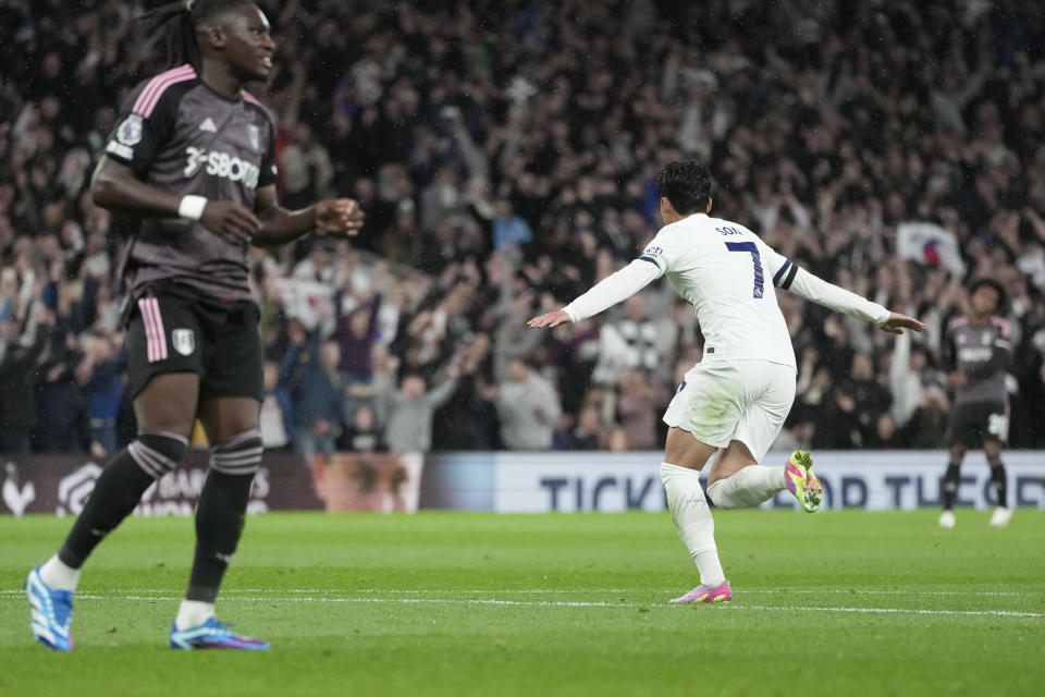 Tottenham's Son Heung-min celebrates after scoring his side's opening goal during the English Premier League soccer match between Tottenham Hotspur and Fulham at the Tottenham Hotspur Stadium in London, Monday, Oct. 23, 2023. (AP Photo/Kin Cheung)