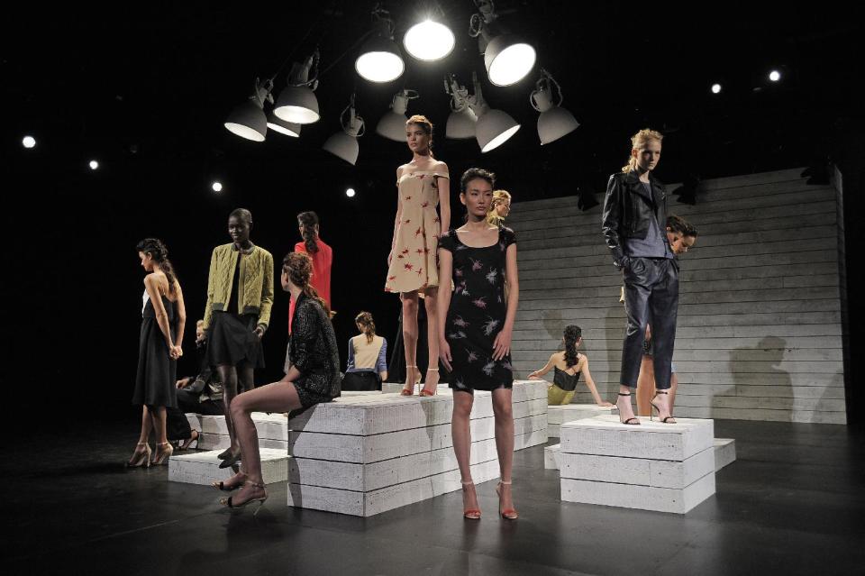 In this photo provided by Holmes & Yang, the Holmes & Yang Spring 2013 collection is modeled during Fashion Week in New York, Tuesday, Sept. 11, 2012. (AP Photo/Holmes & Yang, Dan Ashby)