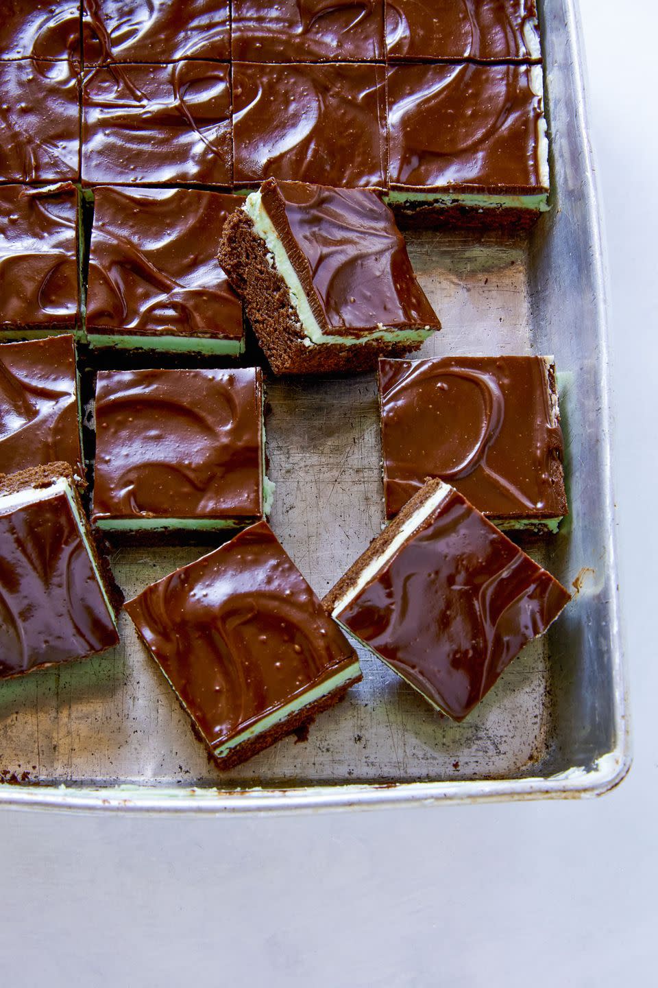 <p>These are the ultimate indulgence, for St. Patrick's Day and beyond. Fudgy <a href="https://www.delish.com/cooking/recipe-ideas/g2796/brownie-recipes/" rel="nofollow noopener" target="_blank" data-ylk="slk:brownies;elm:context_link;itc:0;sec:content-canvas" class="link ">brownies</a>, a peppermint <a href="https://www.delish.com/cooking/videos/a52002/how-to-make-buttercream-frosting-video/" rel="nofollow noopener" target="_blank" data-ylk="slk:buttercream;elm:context_link;itc:0;sec:content-canvas" class="link ">buttercream</a>, and a luscious ganache layer combine into a mint chocolate lover's dream come true.</p><p>Get the <strong><a href="https://www.delish.com/cooking/recipe-ideas/recipes/a57051/andes-brownies-recipe/" rel="nofollow noopener" target="_blank" data-ylk="slk:Andes Brownies recipe;elm:context_link;itc:0;sec:content-canvas" class="link ">Andes Brownies recipe</a></strong>.</p>