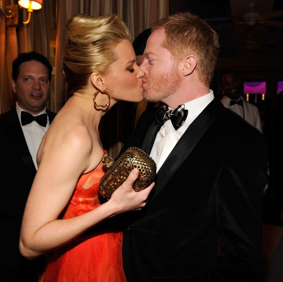 Elizabeth Banks and Jesse Tyler Ferguson attend the 2013 Vanity Fair Oscar Party hosted by Graydon Carter at Sunset Tower on February 24, 2013 in West Hollywood, California.