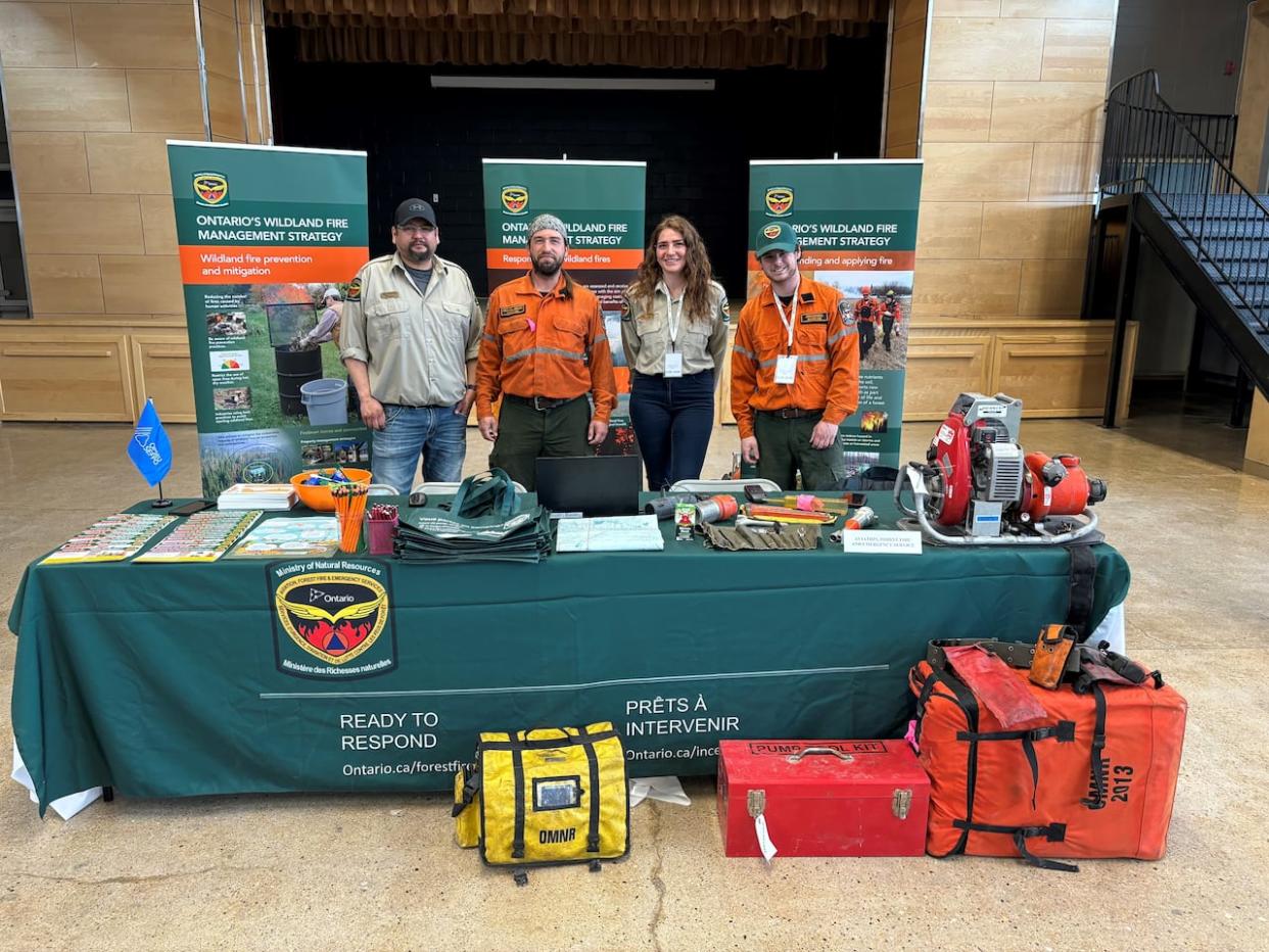 An MNRF recruitment team in Hearst  poses for a photo earlier this week. (Jordan Reda/Ontario Forest Fires  - image credit)